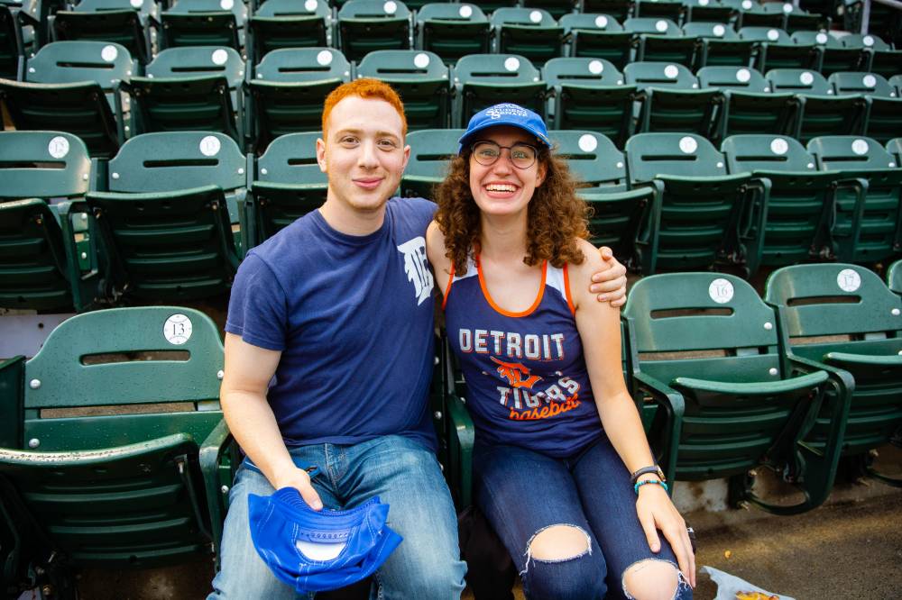 Photo of two in the stands at Comerica Park